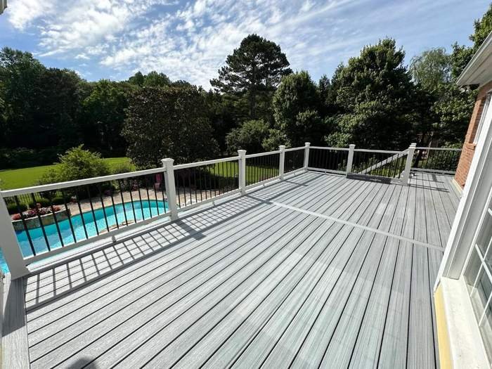 Composite pool deck with white railing