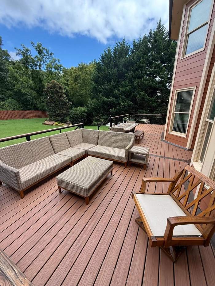 Brown composite deck with outdoor seating